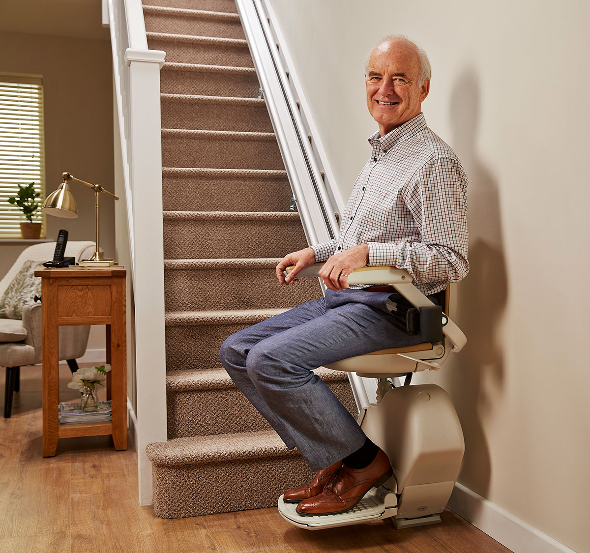 Man sitting on Acorn Stairlift